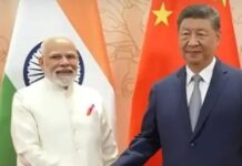 शी जिनपिंग से चीन में मिले पीएम मोदी